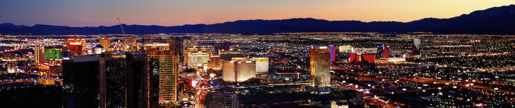 Las Vegas - March 4, Las Vegas City Skyline panorama with sunset, mountain, luxury hotels and streets, March 4, 2010 in Las Vegas, Nevada.